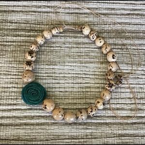 South American fair trade Tagua nut jewelry